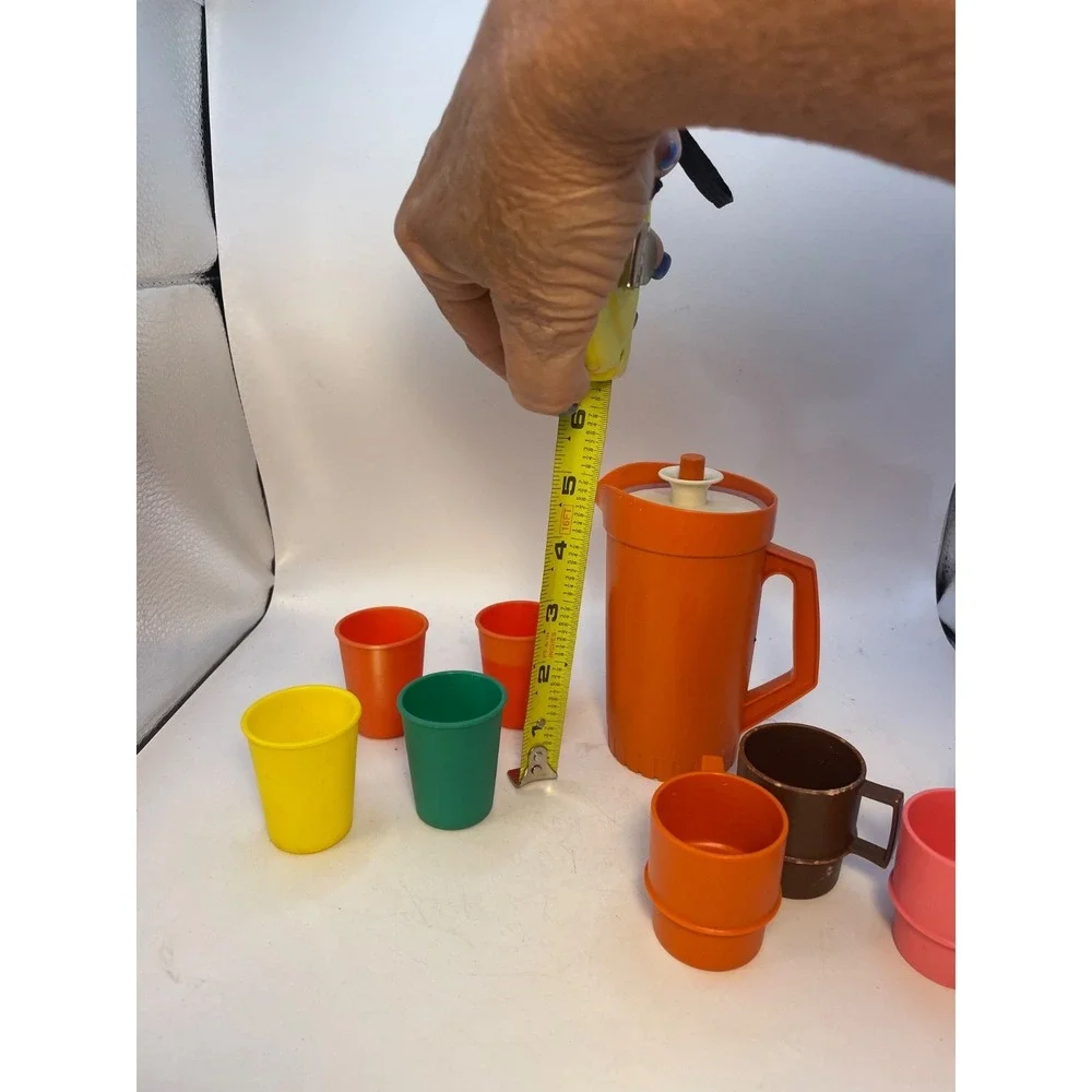 1970 vintage Tupperware  Toys  10 Piece;Orange pitcher with lid 4 cups 4 glasses